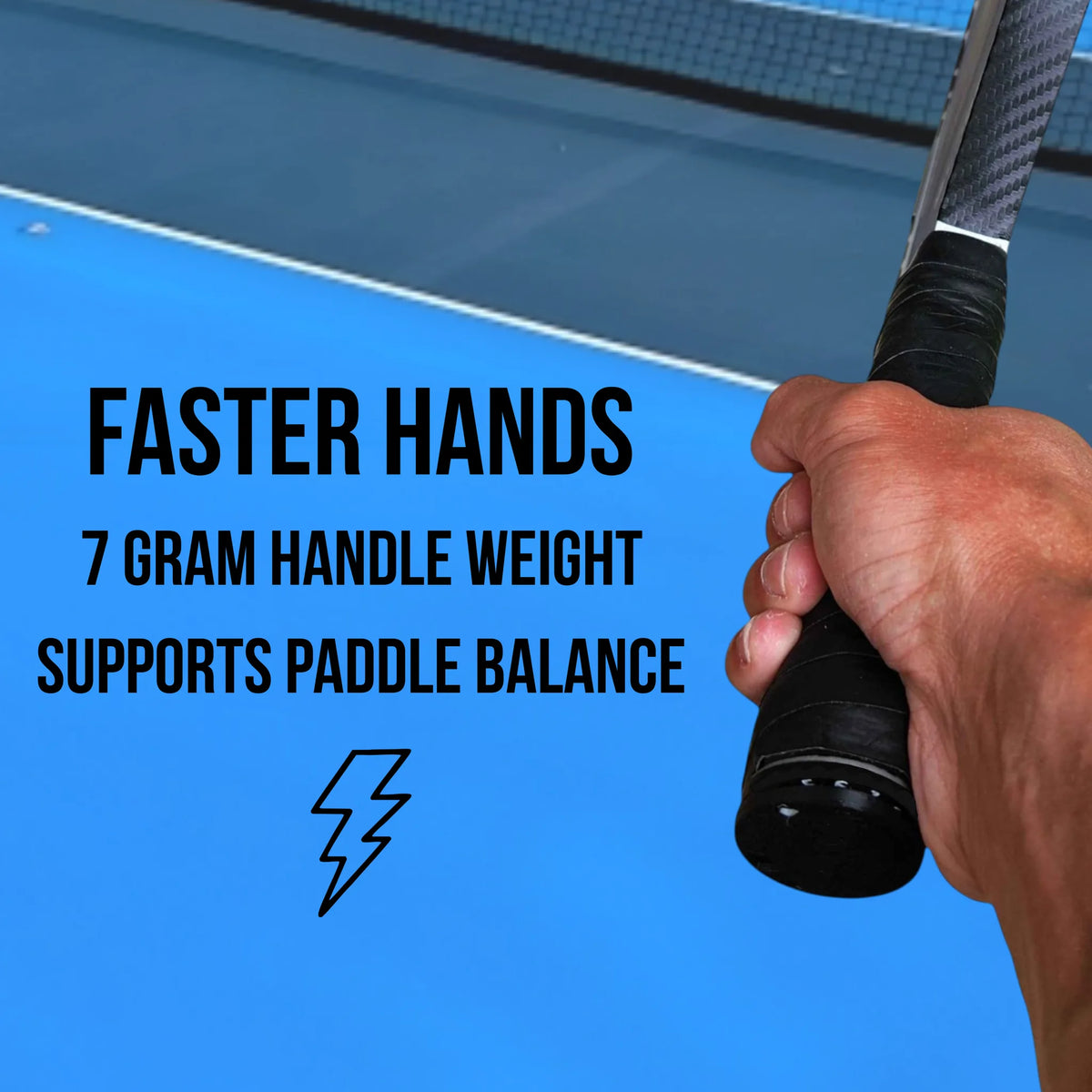 A close-up of a hand gripping a tennis paddle handle with promotional text on a blue table tennis court background. The text reads: 'FASTER HANDS 7 GRAM HANDLE WEIGHT SUPPORTS PADDLE BALANCE' with a lightning icon.